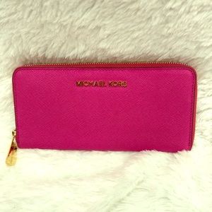 Michael Kors  pink wallet Zip Continental